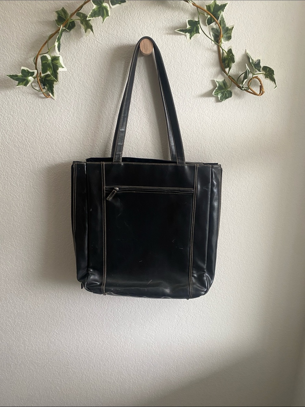 Unisex Black Leather Laptop Tote with Front Zip pocket and Velcro one too.